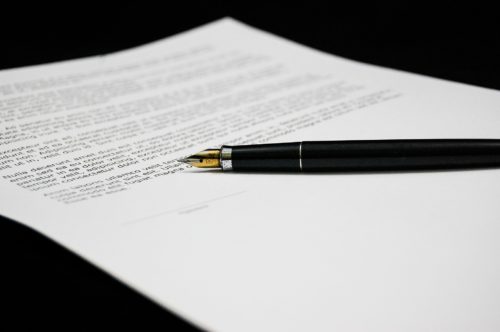 divorce pen and paper sign contract