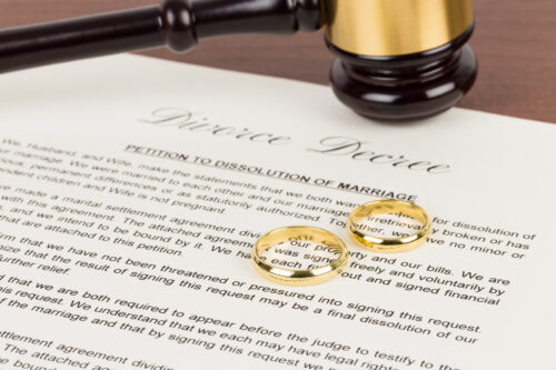 divorce papers wedding rings gavel
